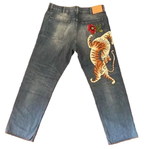 Gucci, blue jeans in denim di cotone + elastan Colore blu délavé Taglia W38