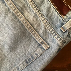 Gucci, blue jeans in denim di cotone Colore azzurro délavé Taglia 46 IT